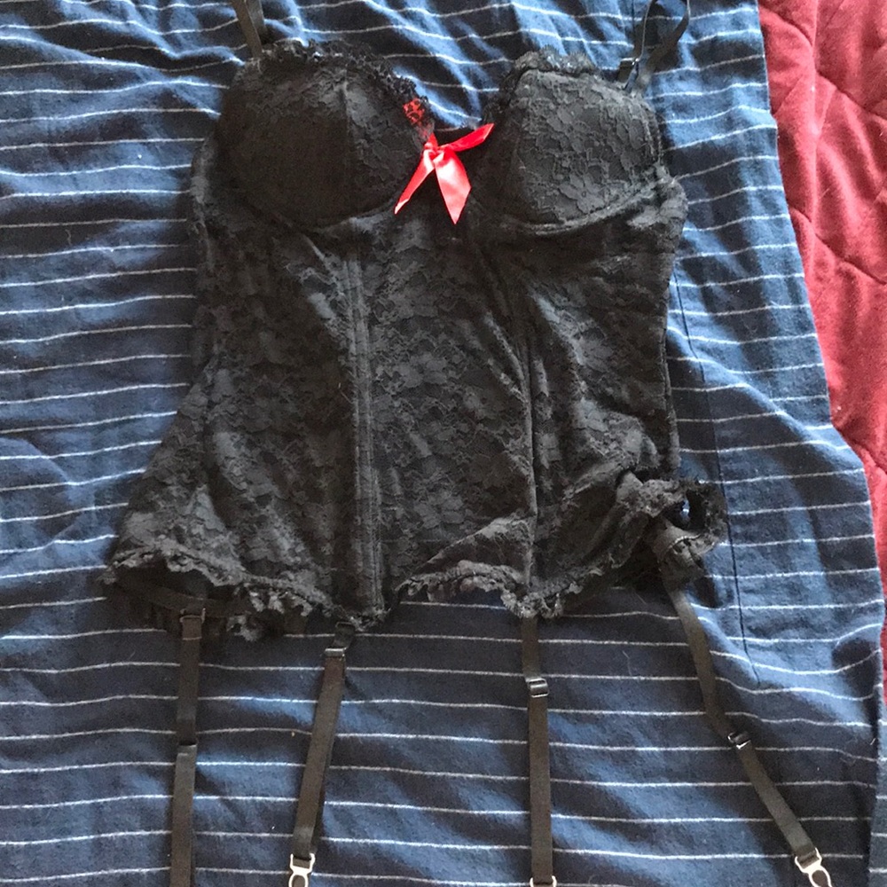 Black lace bustier with red bow